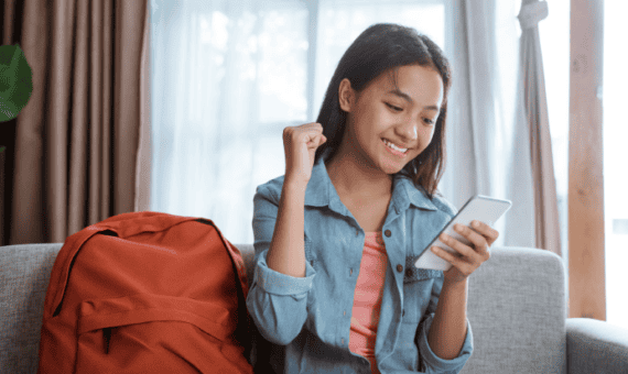 student using PowerSchool on a phone at back to school